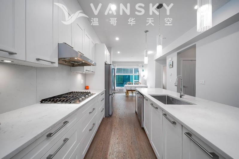 250430150314_kitchen and island 4.jpg